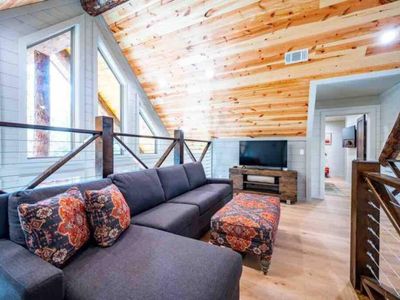 The loft area with a King Tempur-Pedic sleeper sofa!