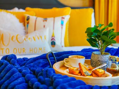 Wake up feeling ready to chase the day in this bright, adventure-forward bedroom.