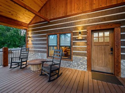 The front porch welcomes you with rocking chairs!