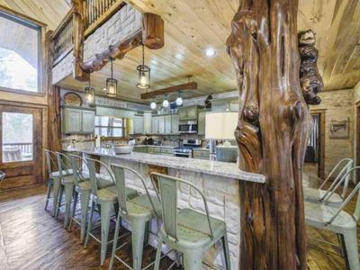 The living room flows seamlessly into the kitchen so you don't miss a moment.