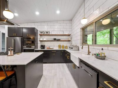 The white, black and gold decor is the epitome of modern luxury.