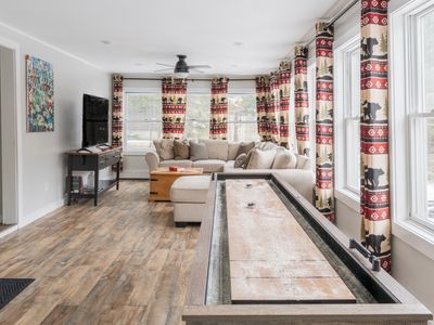 Play a game of shuffleboard in our foyer