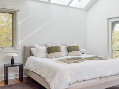 The primary bedroom, completely private on its own level of the home.