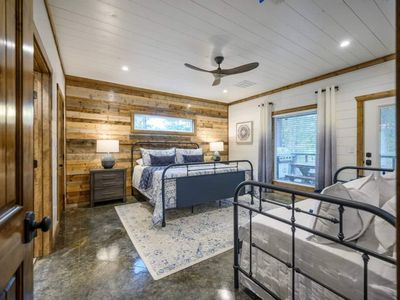 Main Level King suite (2) w/attached ultra-lux oversized private bath & Daybed