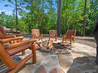 The fire pit with chairs surrounding!