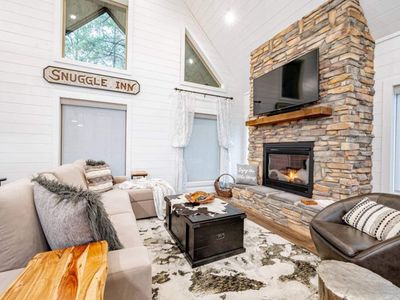This living room has a Queen sofa sleeper for extra comfort.
