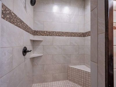 A closer view of the walk-in shower.