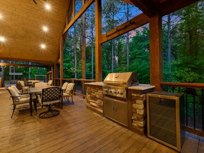 Outdoor kitchenette and dining table.