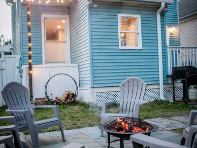 Unwind at night on the bluestone patio, perfect for bonfires under the lights in the heart of Kingston.