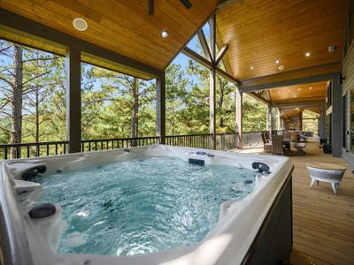 8-person hot tub on the covered porch!
