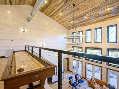 Shuffleboard, pool table and arcade console!