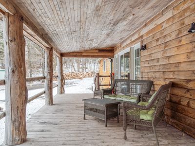 The covered front porch is the perfect place to enjoy a cup of coffee or tea in the morning