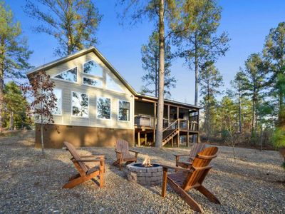 The fire pit with 4 Adirondack chairs!
