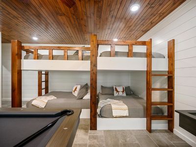 The bunk room is home to 6 Queen beds.