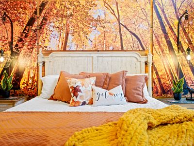 The king sized bed and colorful, plush bedding make this the perfect room for those who want to fall asleep among the colors of the season.