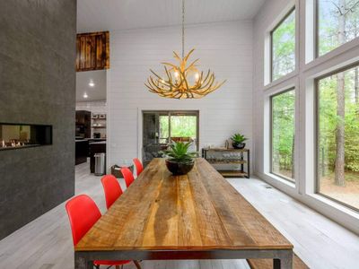 The antler chandelier adds a rustic touch.