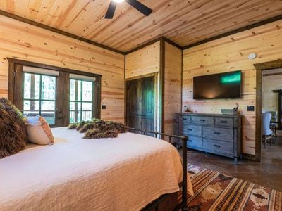 King Suite on the main level with outdoor access.