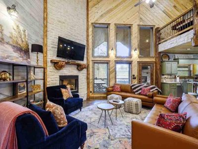 Towering ceilings adorned with hand-cut log beams awaiting your arrival.