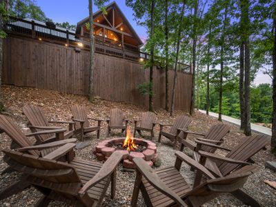 The firepit with Adirondack chairs.