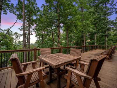 A table with 4 chairs for your outdoor dining experience.