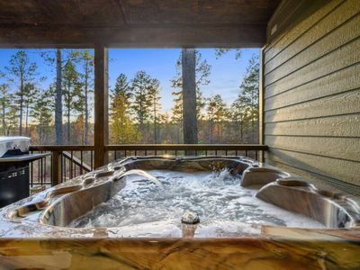 The hot tub is waiting for you to relax under the night sky!