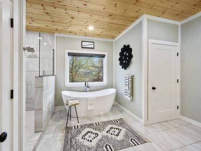 The private bath features an oversized soaking tub!