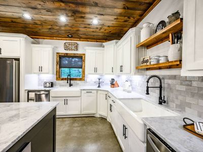 This modern kitchen is a farmhouse dream.