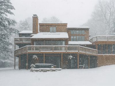 Digitally edited to showcase winter ambiance; home may appear differently depending on the season.