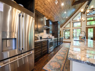 Stainless steel appliances in the kitchen.