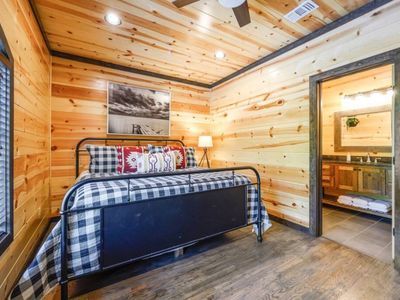 Upstairs King Bedroom 3 with a private bath + a twin daybed with trundle.