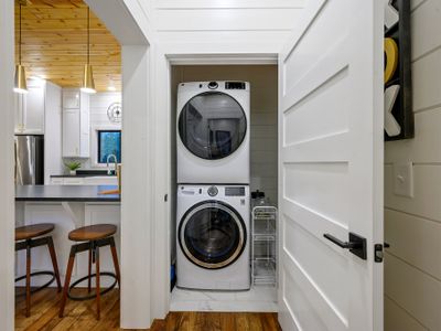 A washer and dryer are found off of the kitchen.