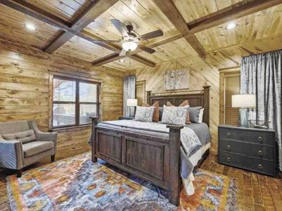Downstairs Master Suite 3 with views to the outdoor entertainment area.