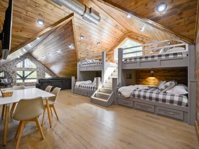 Bunk room with Queen-over-King custom bunk beds!