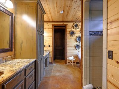 This private bathroom has a walk-in shower as well as a soaking tub!