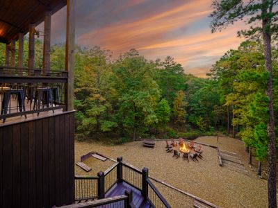 Follow the deck and you’ll discover even more ways to relax and play: a huge backyard, a horseshoe pit, and a giant firepit perfect for roasting marshmallows and telling stories.