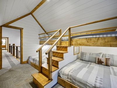The bunk room featuring 2 Twin XL over King bunks.