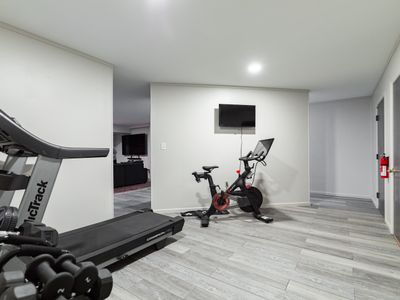 peloton exercise bike available to use in basement