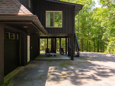 Covered sitting area by the main entryway
