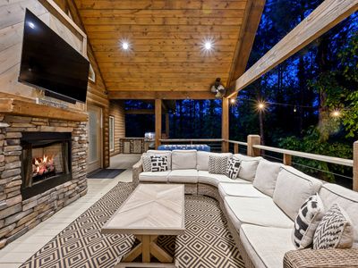 The covered patio lit up at night.