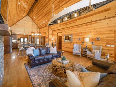 Additional lounge chairs in the living room and  canoe chandelier!