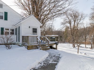 Walkway to the mudroom entry of the home.