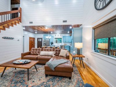 You are greeted by an open floor plan, ensuring you never miss a moment
