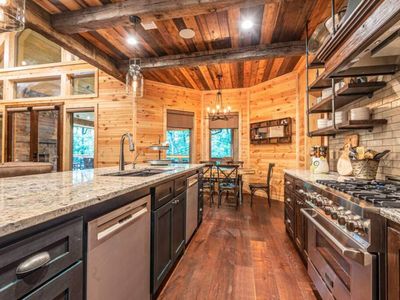 A gas stovetop and double dishwashers make this kitchen a dream