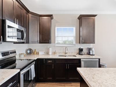 Top unit: All appliances ready for use! (microwave, coffee maker, toaster, and more!)
