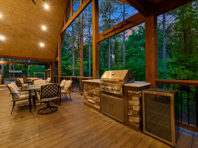 Outdoor kitchenette and dining table.