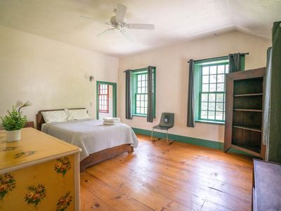 2nd floor guest bedroom with queen sized  bed. Off of Jack and Jill bath.