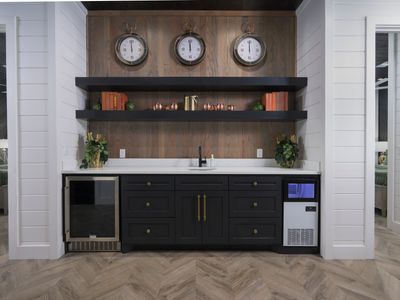 Counter area with sink, ice maker, and wine fridge—perfect for entertaining!