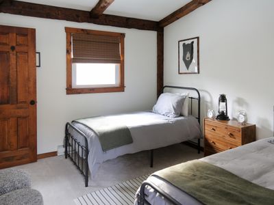 The bear bedroom has two comfortable twin beds, perfect for kids or a group of friends.