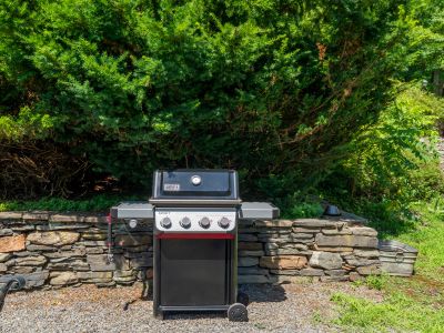 The grill is just off the kitchen, perfect for easy prep and enjoyment!