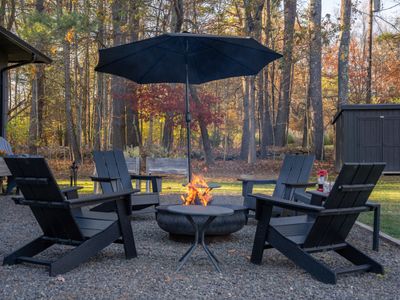 Gather by the fire pit at Oakwood Cabin!